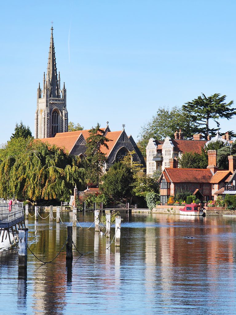 The River Thames at Marlow in England with Weir and Church in the background